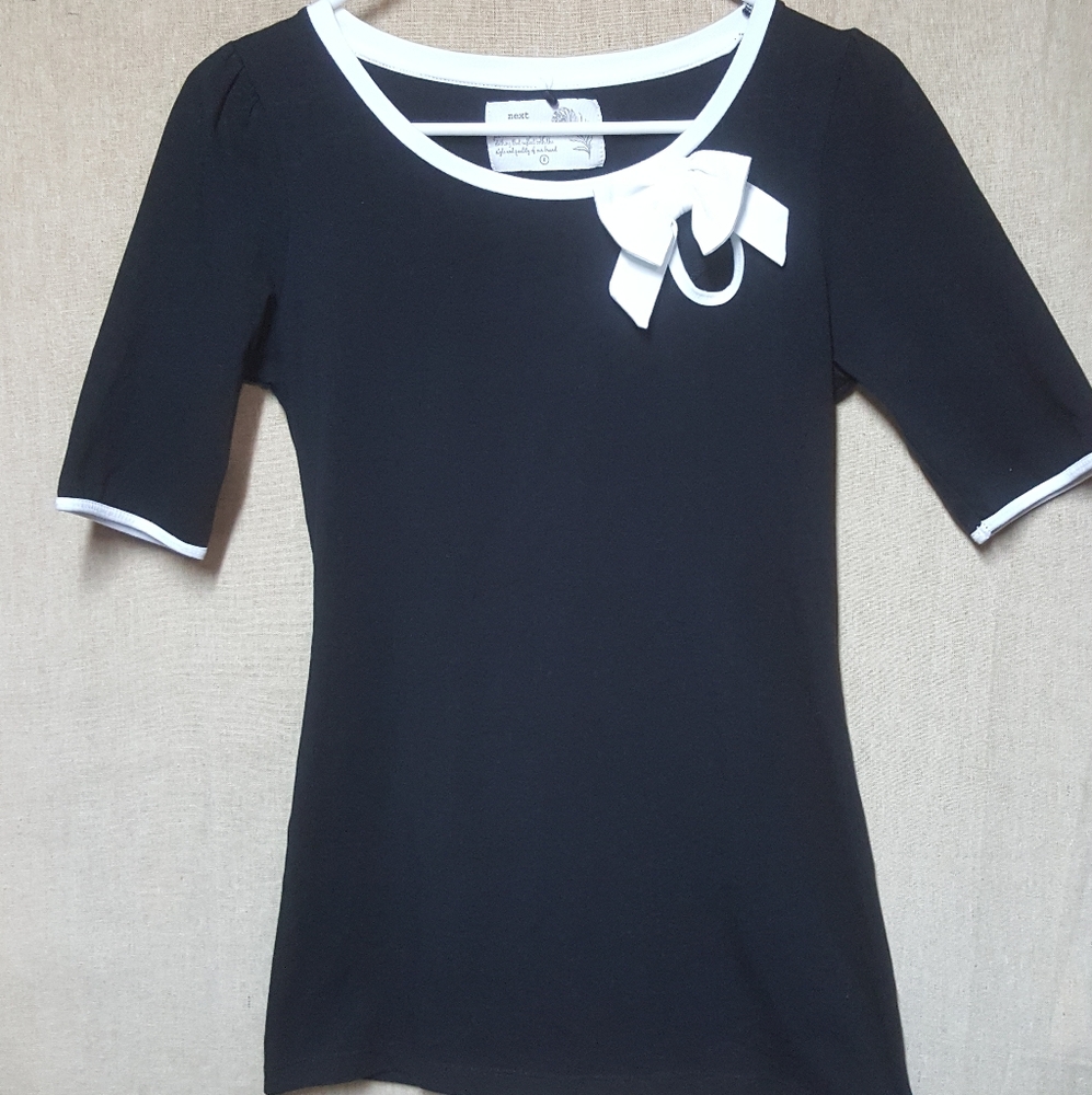 Black shirt with white bow